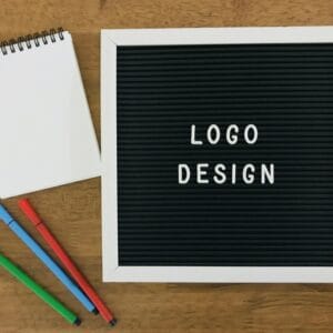 Logo Design on wooden background 100